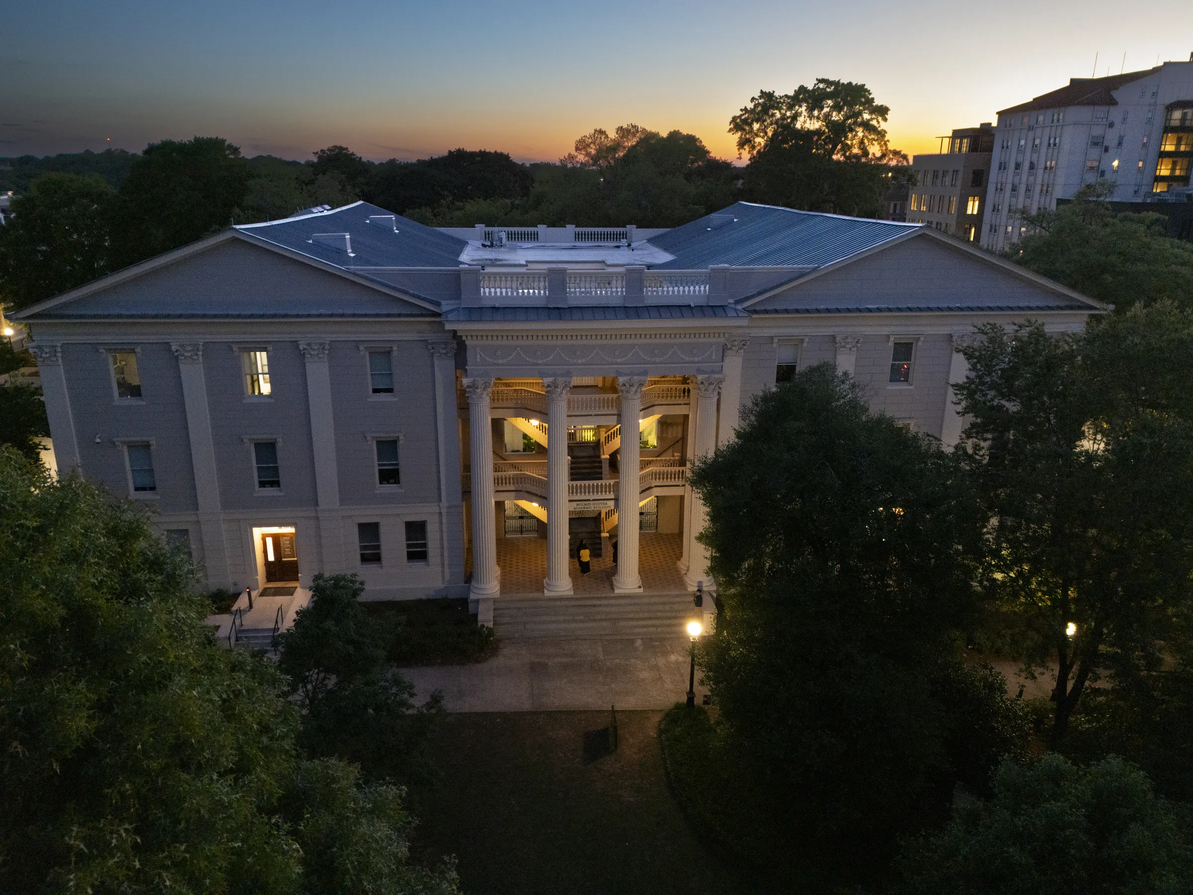 The Holmes-Hunter Academic Building on UGA's North Campus during a sunset.